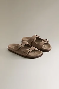 SANDALES PLATES CUIR BOUCLES