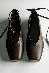 Tied leather ballet flats