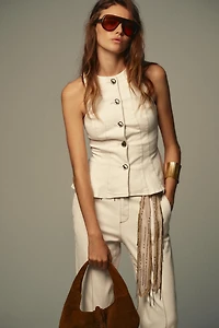 STITCHED PEPLUM VEST