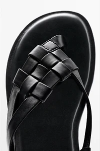 Flat woven leather sandals