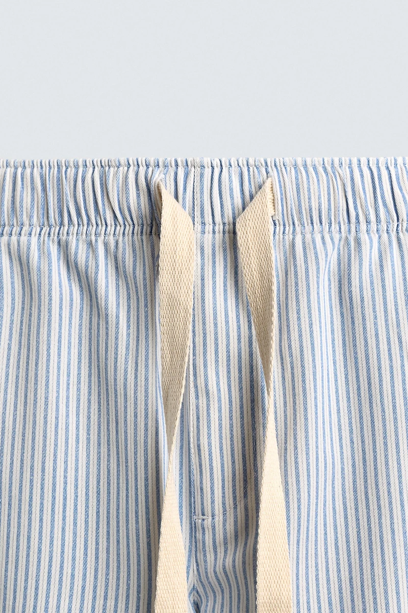 STRIPED BAGGY FIT PANTS