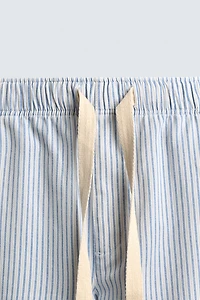 STRIPED BAGGY FIT PANTS
