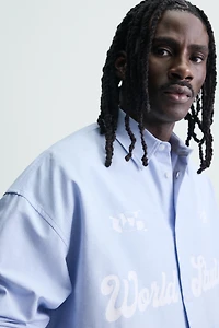 PRINTED TEXT OXFORD BOXY FIT SHIRT