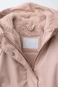 VESTE DÉPERLANTE ENDUITE EFFET FOURRURE