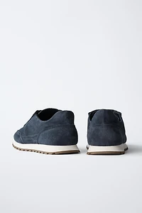 BASKETS EN CUIR