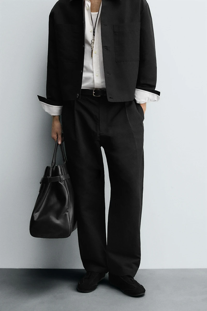 RELAXED FIT PLEATED PANTS