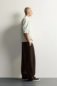 SIDE-PLEAT BALLOON FIT PANTS