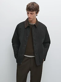 Veste avec col en cuir