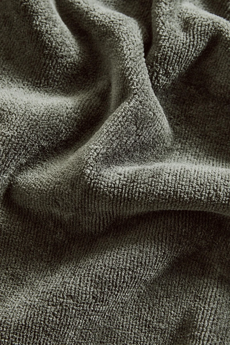 VELOUR OVERLOCK BATH TOWEL