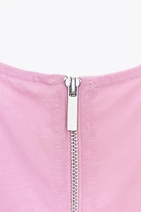 PLEATED ZIP TOP