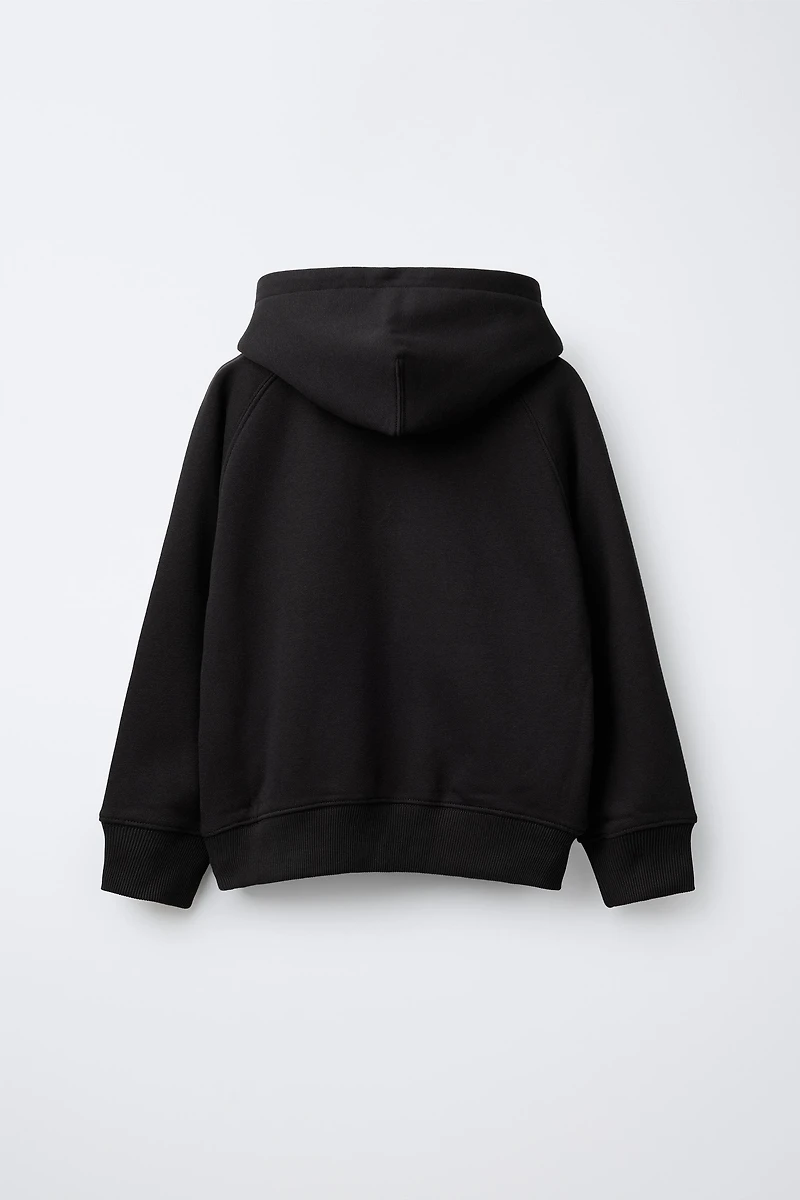 SWEAT POCHE BRODÉE