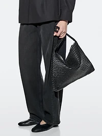 Mid-sized braided leather shoulder bag