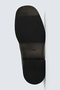 LACED LEATHER BOOTS