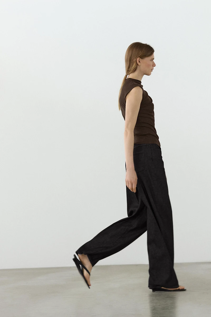 Top asymétrique avec bijou