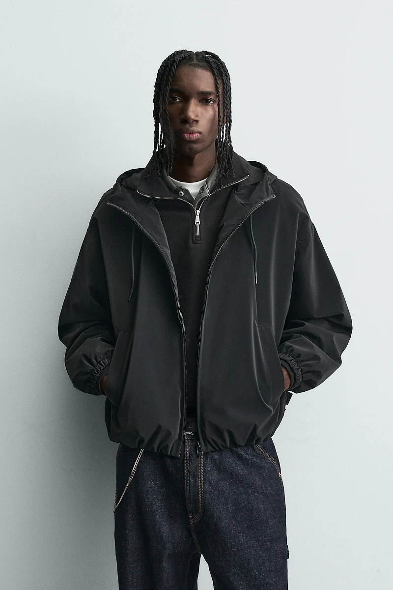 BLOUSON TECHNIQUE LÉGER À CAPUCHE