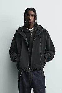 BLOUSON TECHNIQUE LÉGER À CAPUCHE