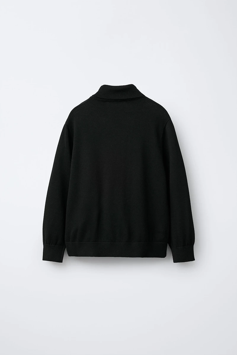 PULL EN MAILLE À COL ROULÉ