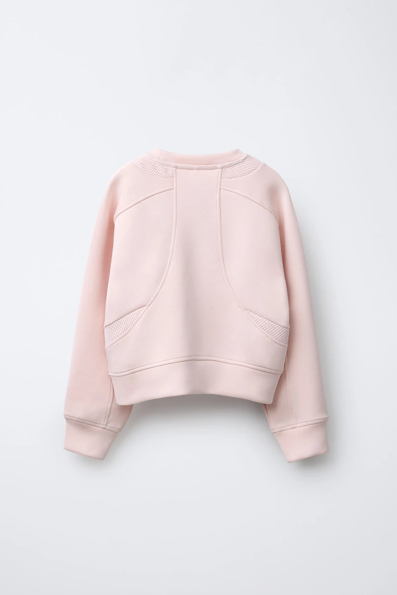 SWEAT BIMATIÈRE RÉSILLE ET INSCRIPTION