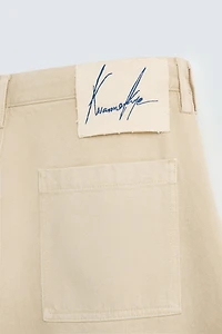 BAGGY FIT BERMUDA SHORTS © OTIS KWAME KYE QUAICOE