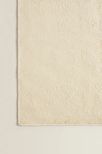 WAVY DETAIL WOOL AREA RUG