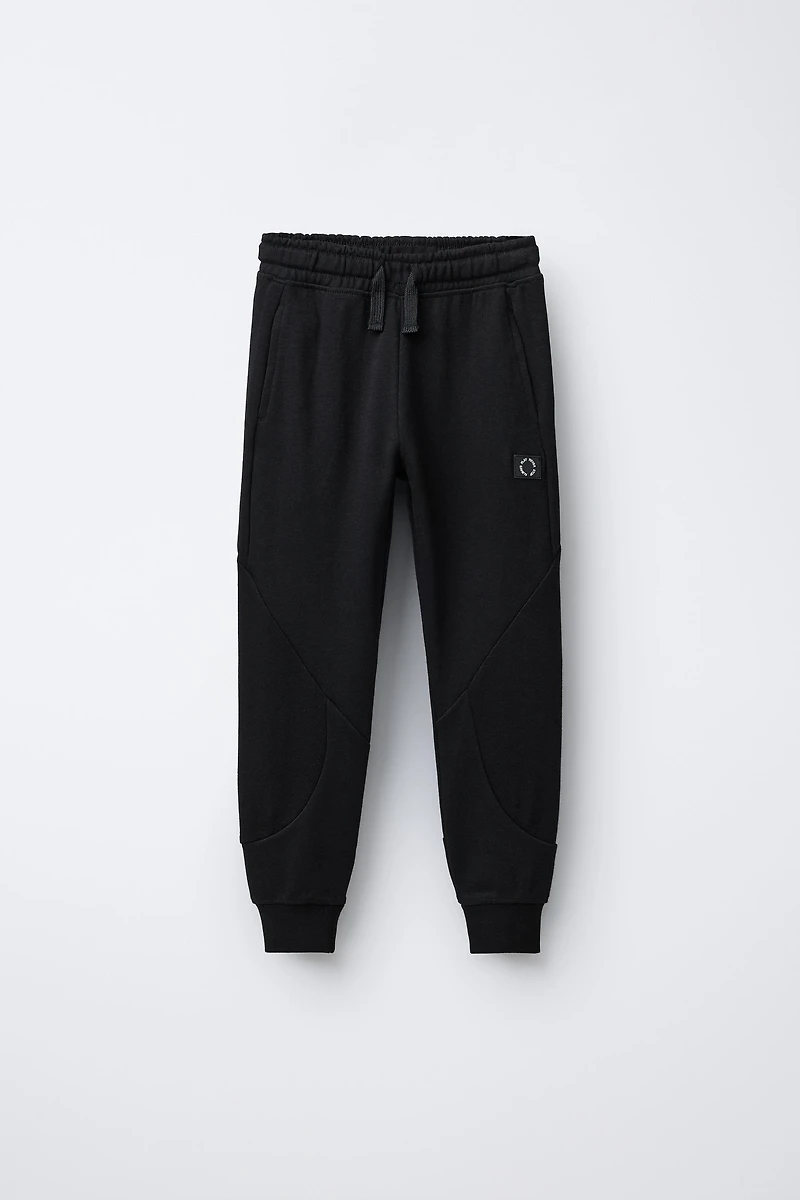 INTERLOCK PIQUÉ JOGGER PANTS
