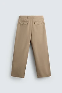 PLEATED WIDE FIT CHINO PANTS