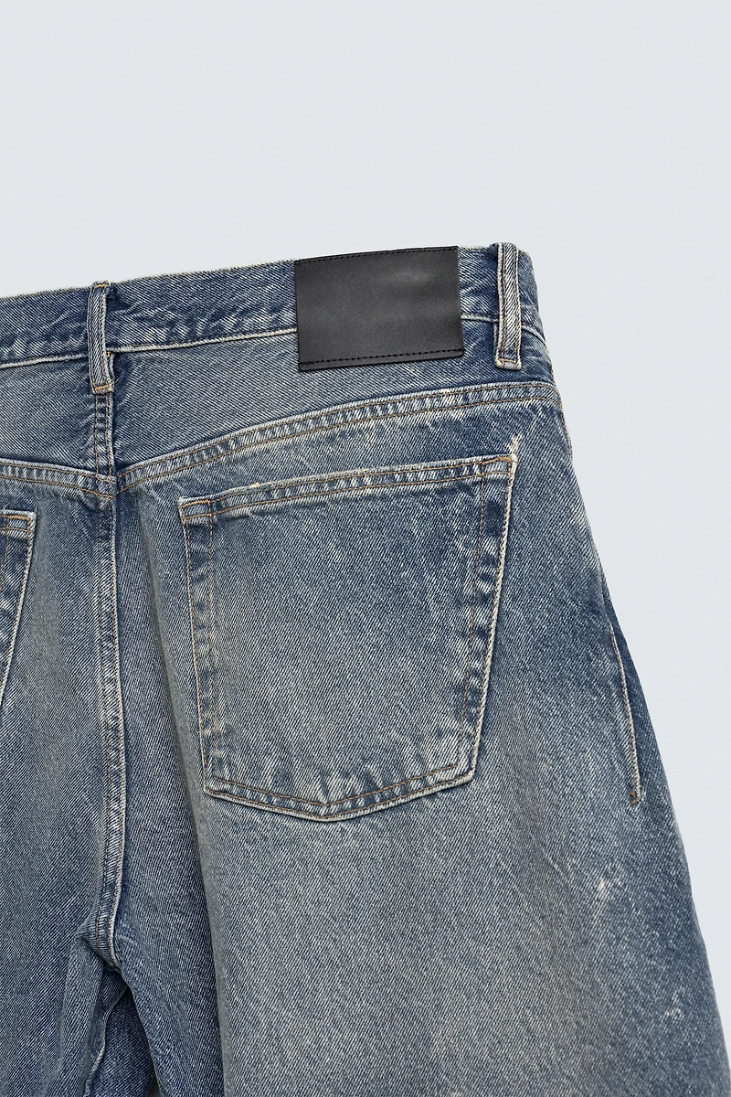 BARREL FIT JEANS WITH TWISTED SEAMS