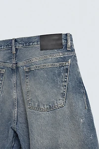 BARREL FIT JEANS WITH TWISTED SEAMS