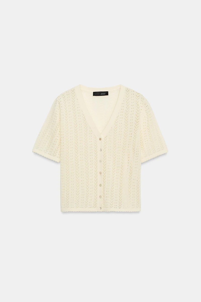 GILET EN MAILLE POINTELLE MANCHES COURTES