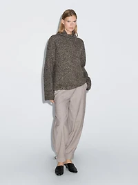 Wool blend trousers with buckle detail