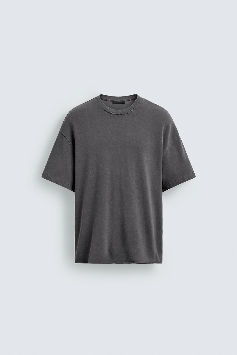 T-SHIRT EN MAILLE À FINITIONS IRRÉGULIÈRES
