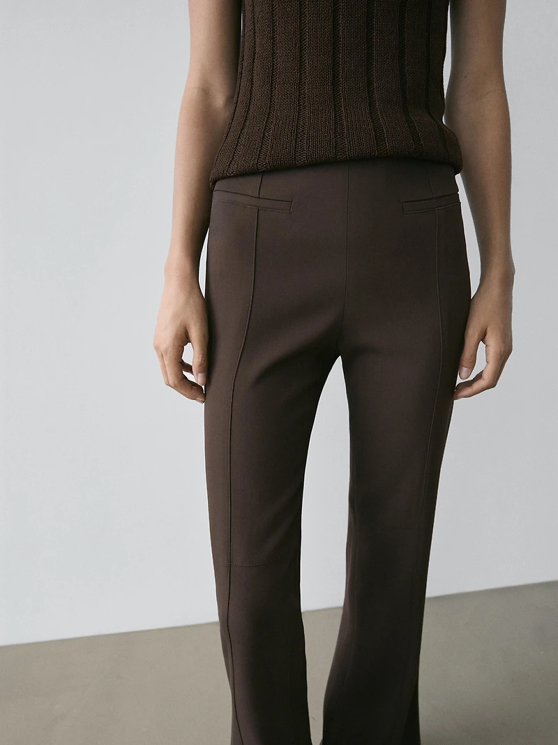 Flared trousers with pocket