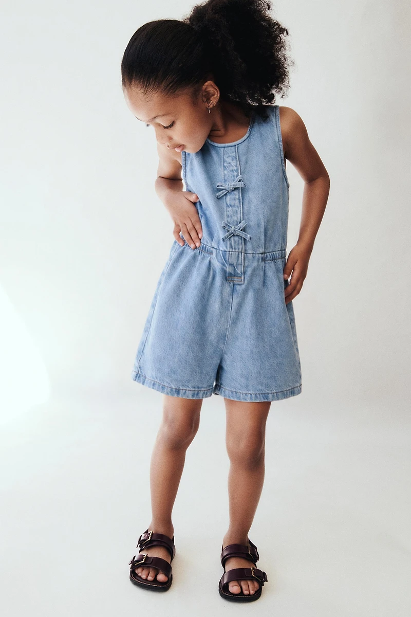 SHORT DENIM JUMPSUIT WITH BOWS