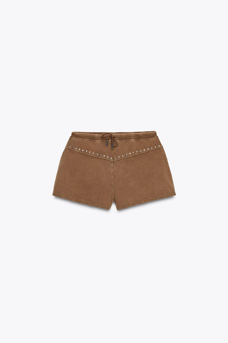 WASHED EFFECT STUDDED SHORTS