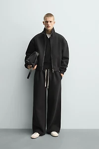 TECHNICAL PLEATED JOGGER PANTS