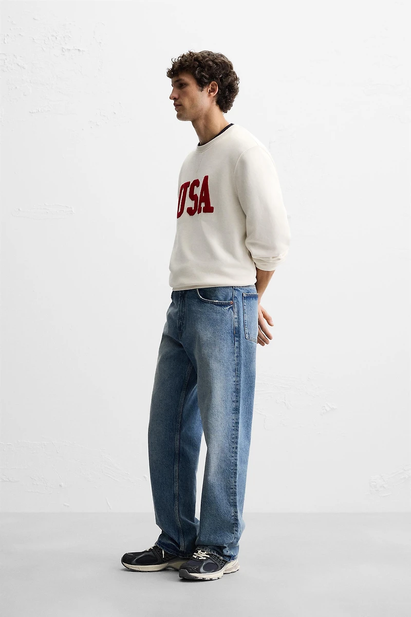 TEXTURED PATCH SWEATSHIRT