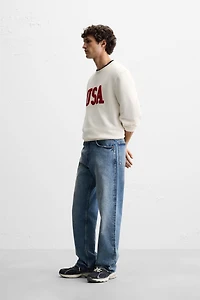 TEXTURED PATCH SWEATSHIRT