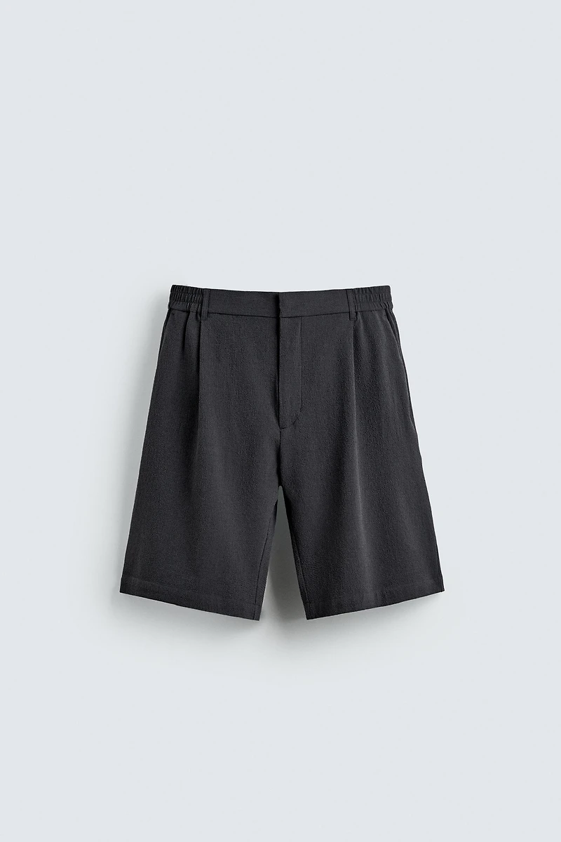 IRREGULAR TEXTURE PLEATED SHORTS