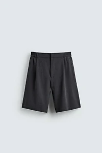 IRREGULAR TEXTURE PLEATED SHORTS