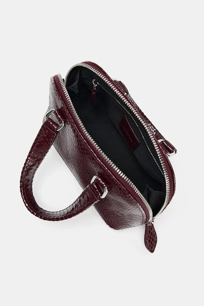 EMBOSSED MINI CITY BAG