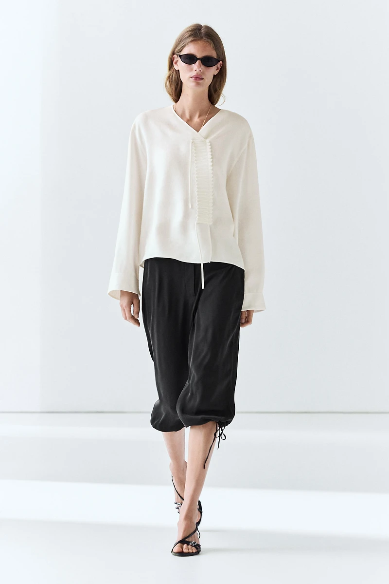 Flowing linen blend blouse with button detail