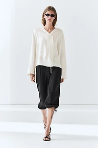 Flowing linen blend blouse with button detail