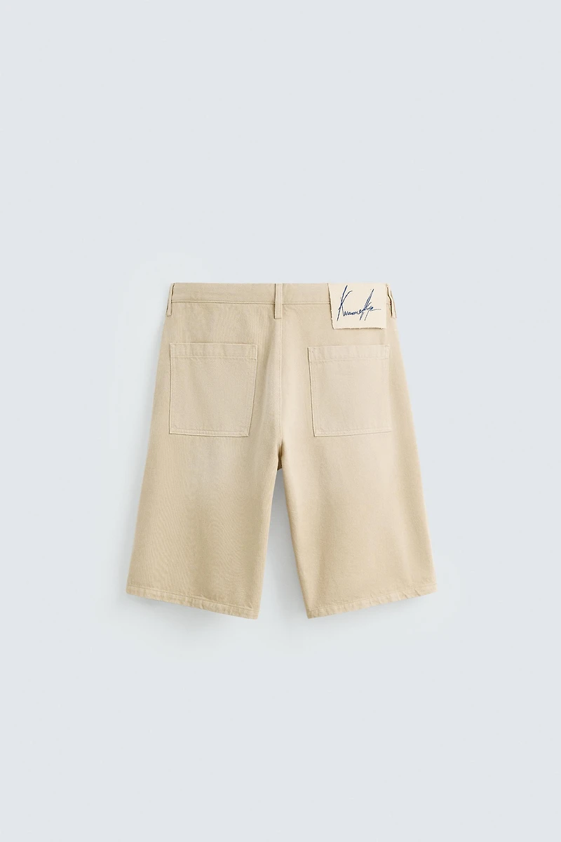 BAGGY FIT BERMUDA SHORTS © OTIS KWAME KYE QUAICOE