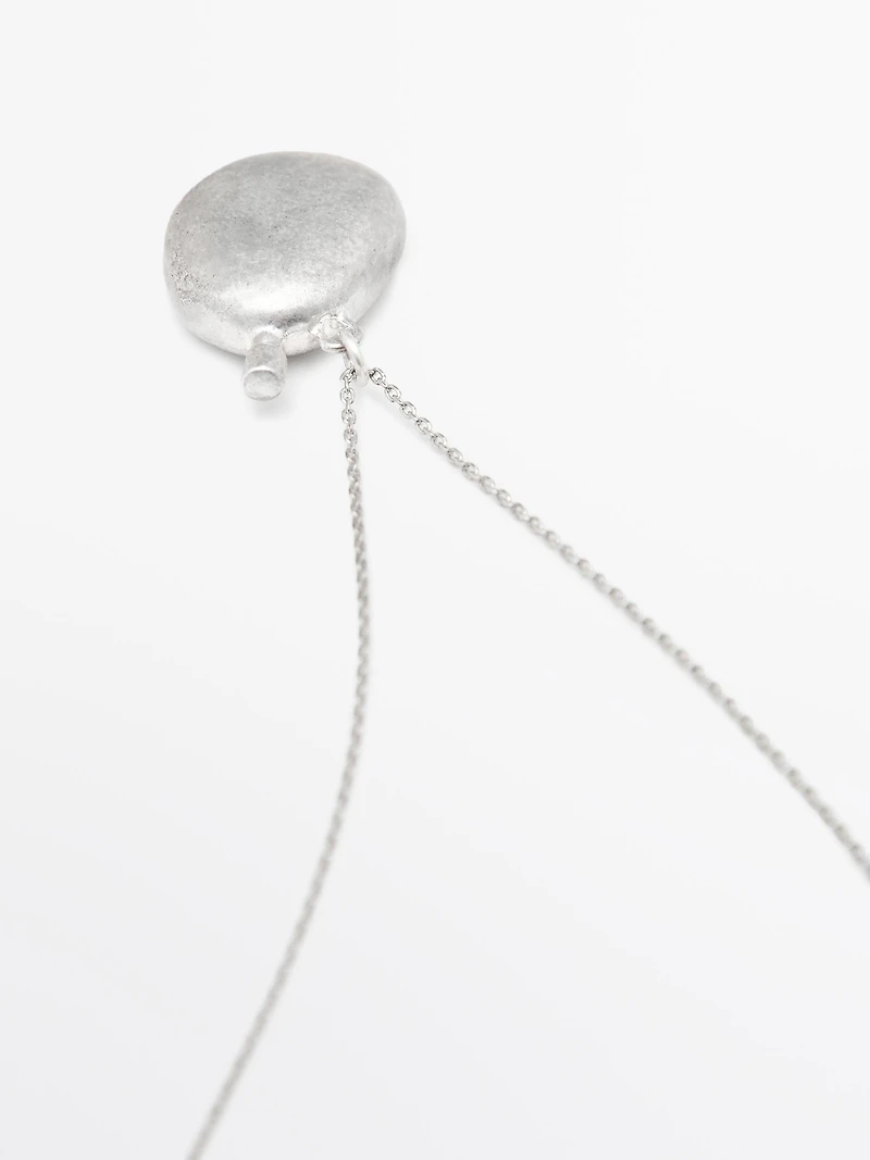 Collier pendentif métallique