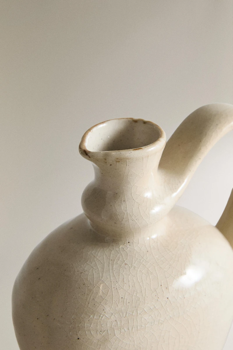 STONEWARE CRUET WITH HANDLE