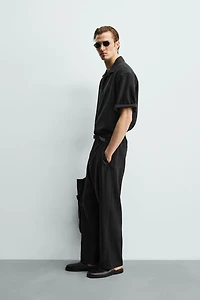 FLOWY PLEATED PANTS