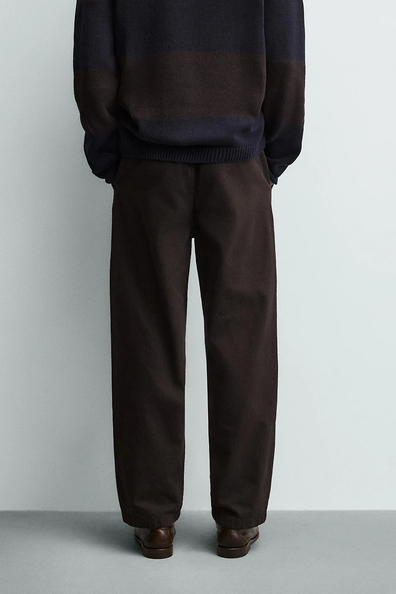 PLEATED STRAIGHT FIT PANTS
