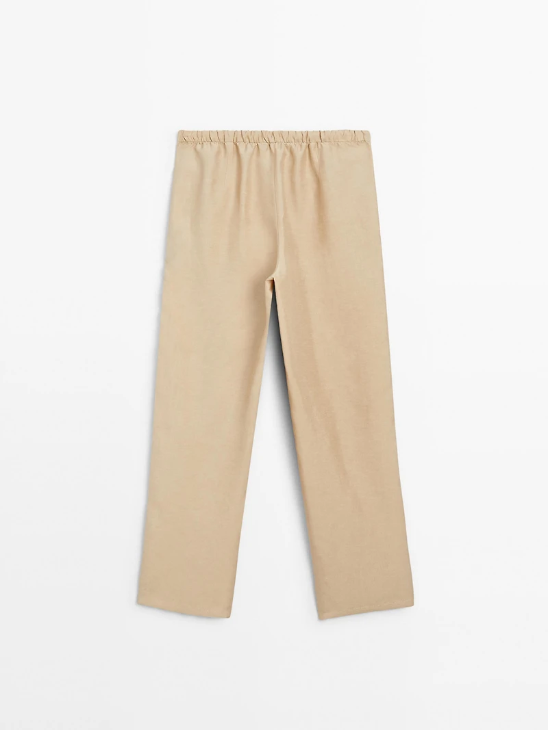 Flowing linen blend barrel fit trousers