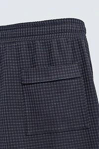 TEXTURED JOGGER SHORTS