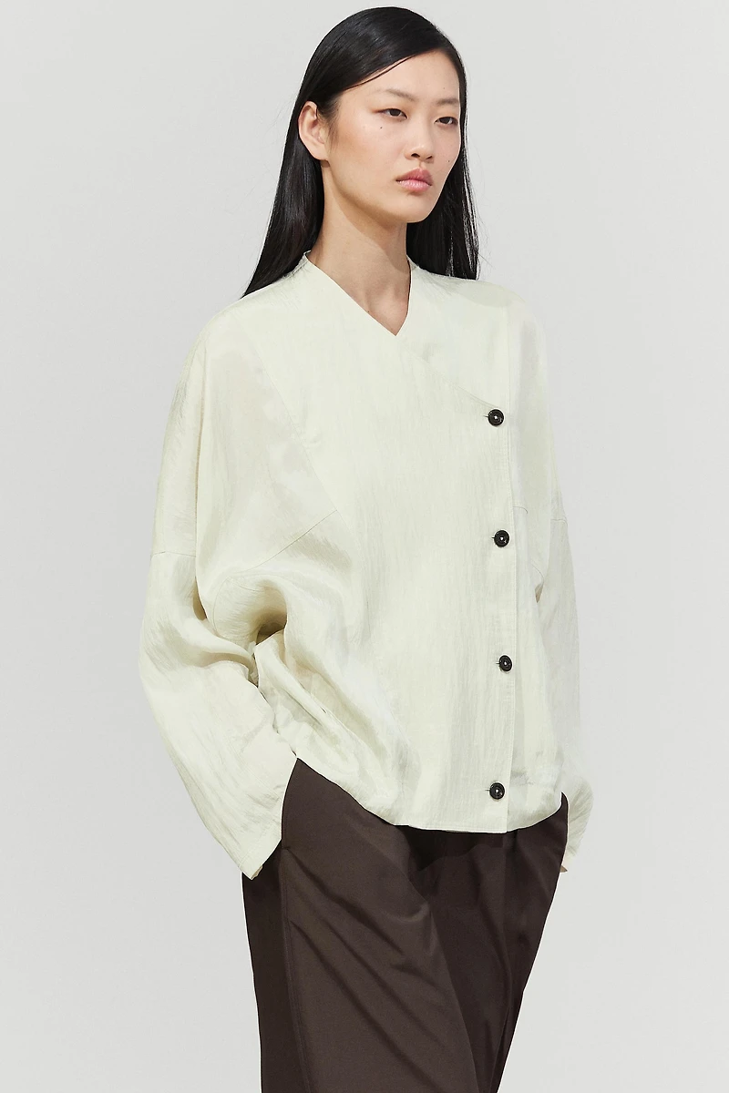 Fluid wrap shirt with button detail